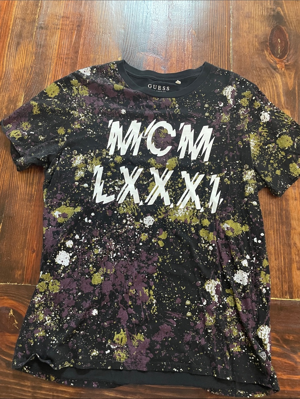 GUESS Black Tee with Purple and Olive Paint-Splatter Graphic